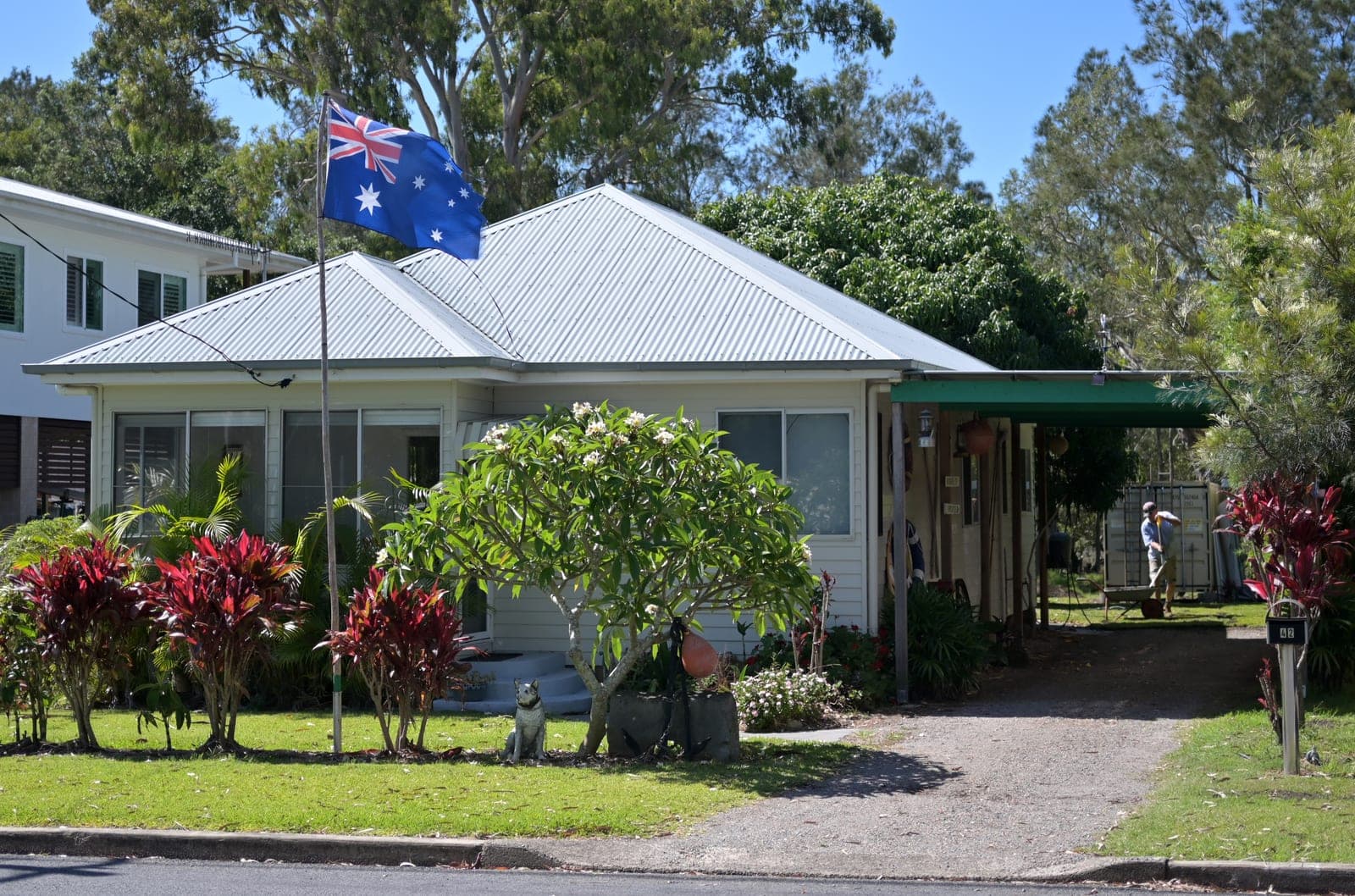 Australian flag flying outside a suburban home