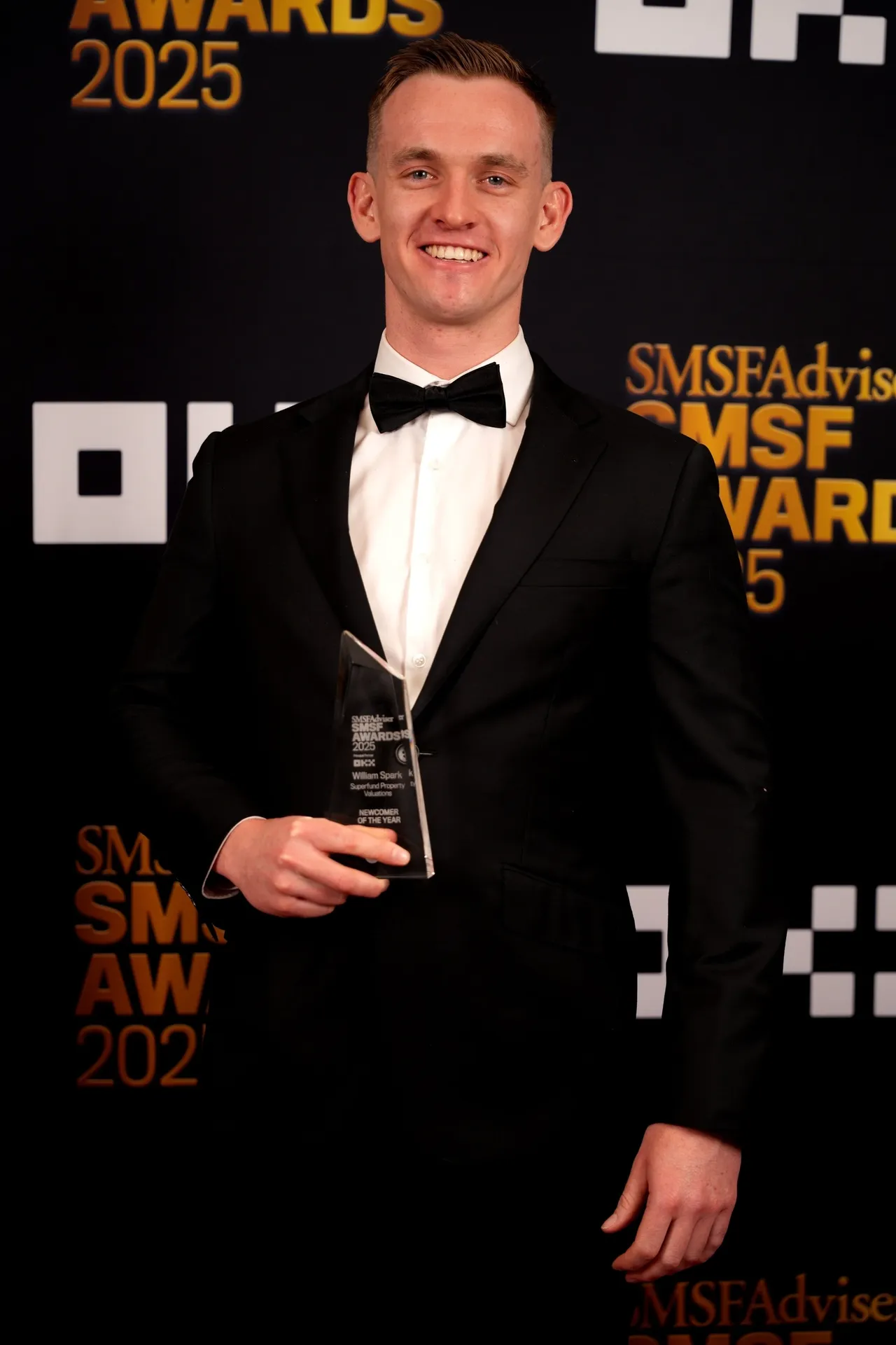 William Spark accepting the SMSF Adviser Awards 2025 Newcomer of the Year trophy